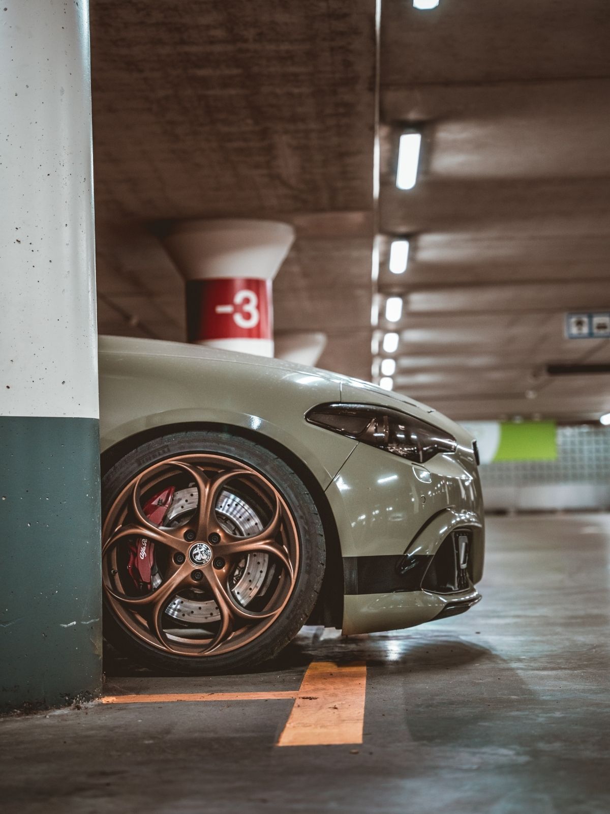 Alfa Romeo Giulia Quadrifolgio Olive drab green on copper wheels