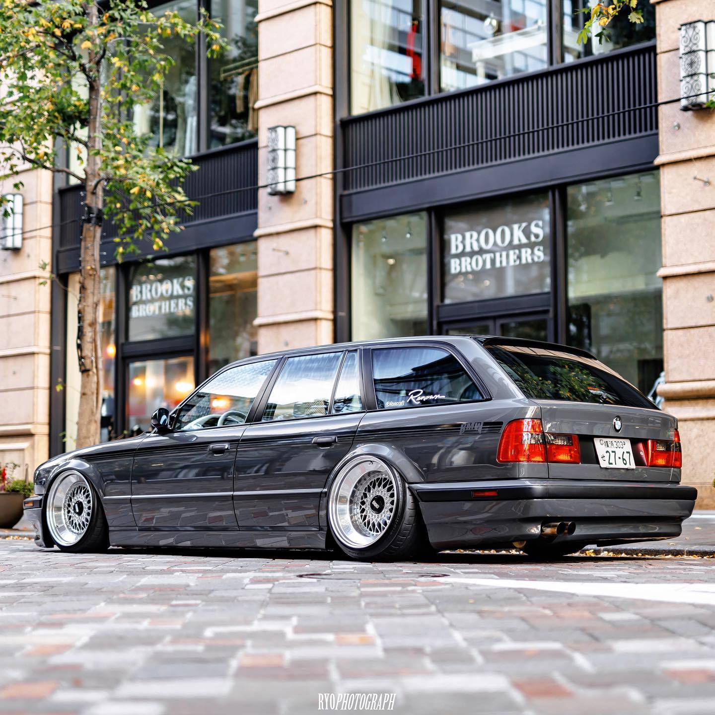 Slammed grey BMW E34 Touring with Airlift air suspension