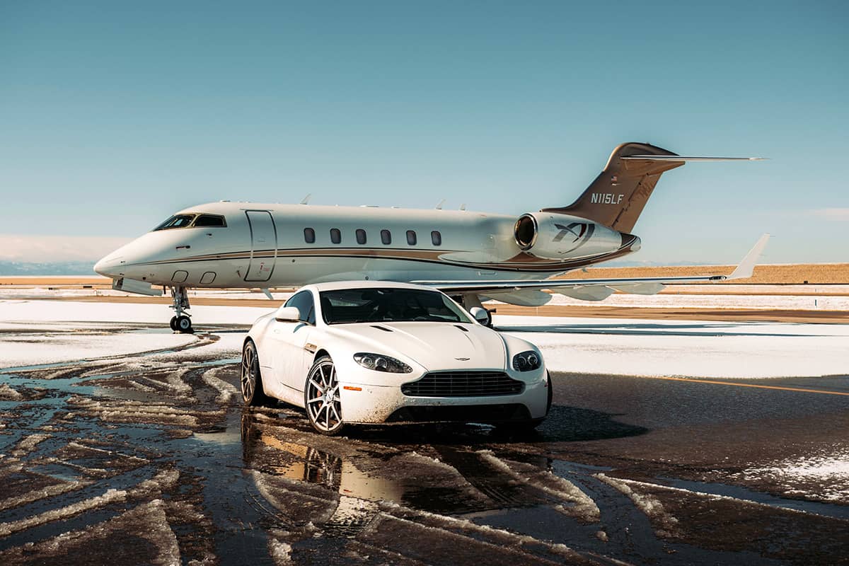 White Aston Martin DBS with custom wheels.