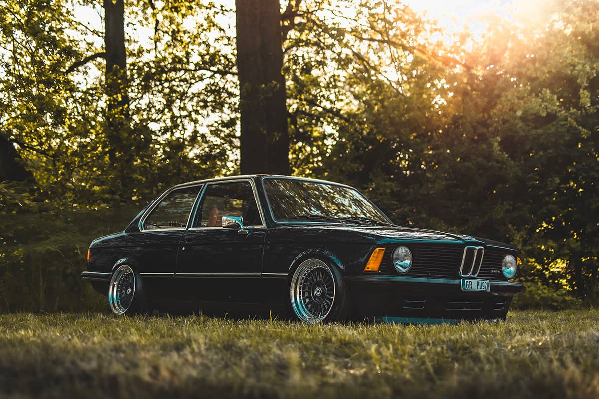 Slammed BMW E21 black with amber turn signals