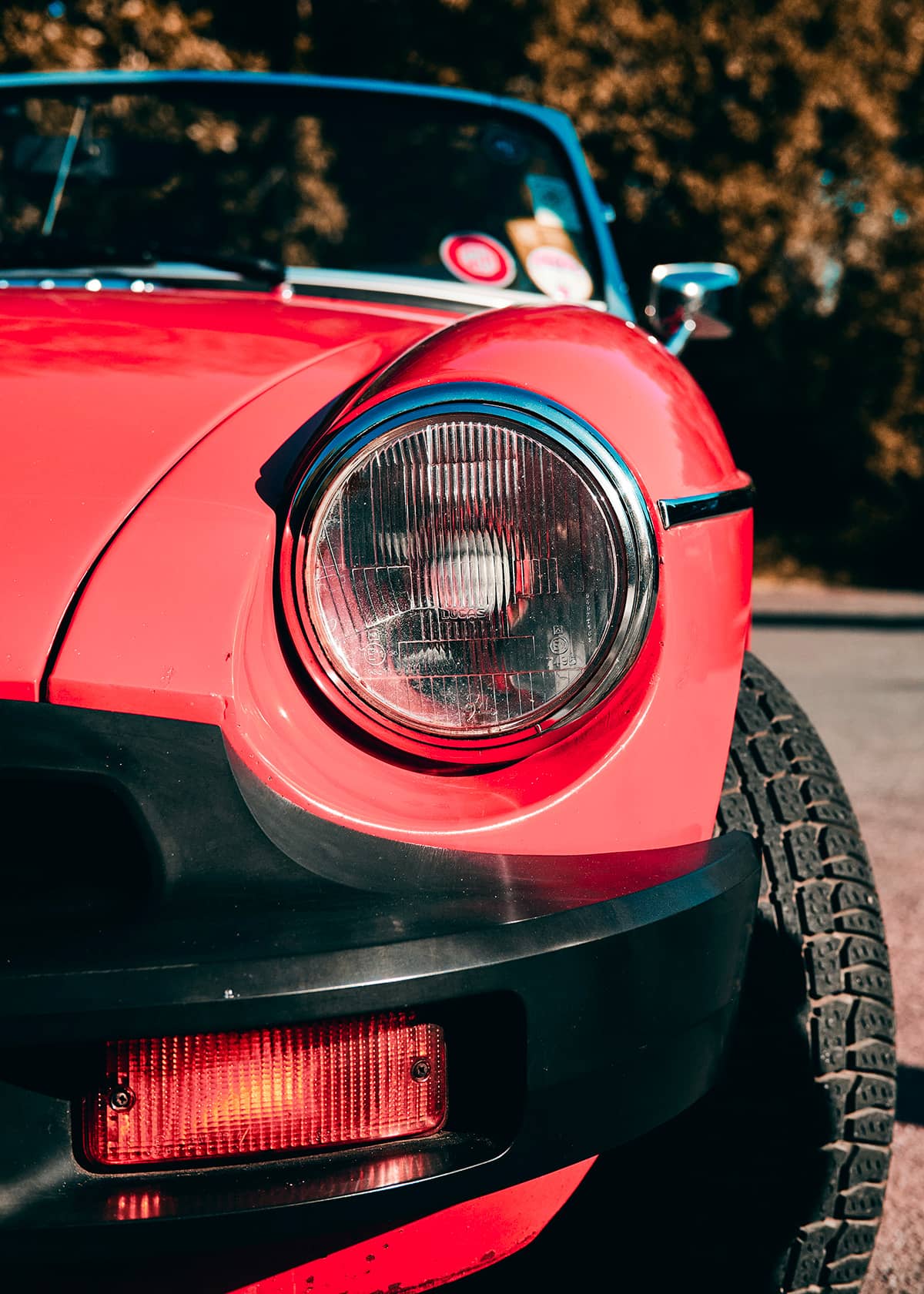Red MGB Roadster round headlight original