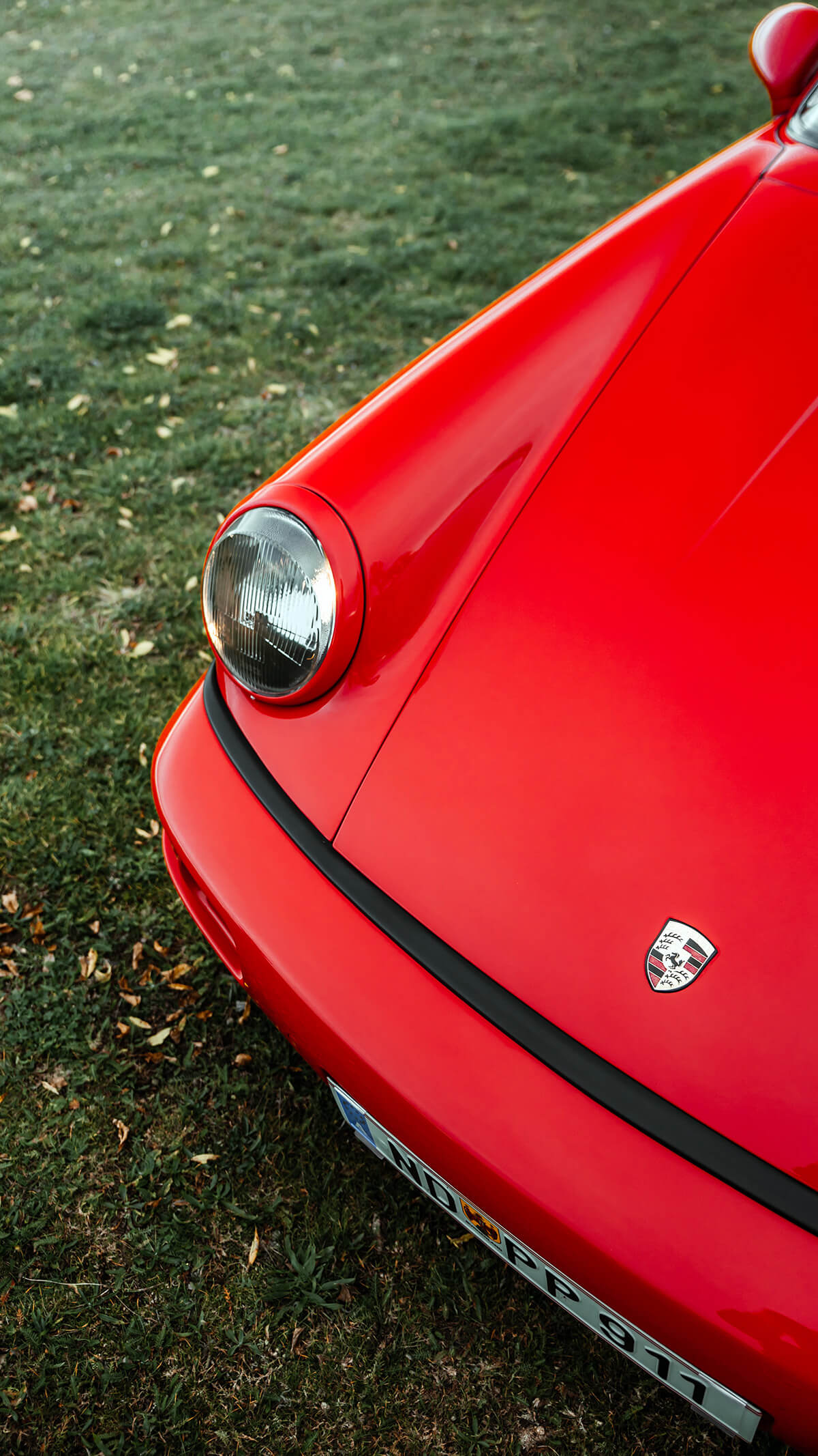 Red Porsche 964 hood and headlight