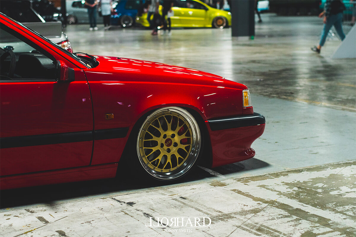 Red Volvo 850R on BBS rims with gold centers and polished lips